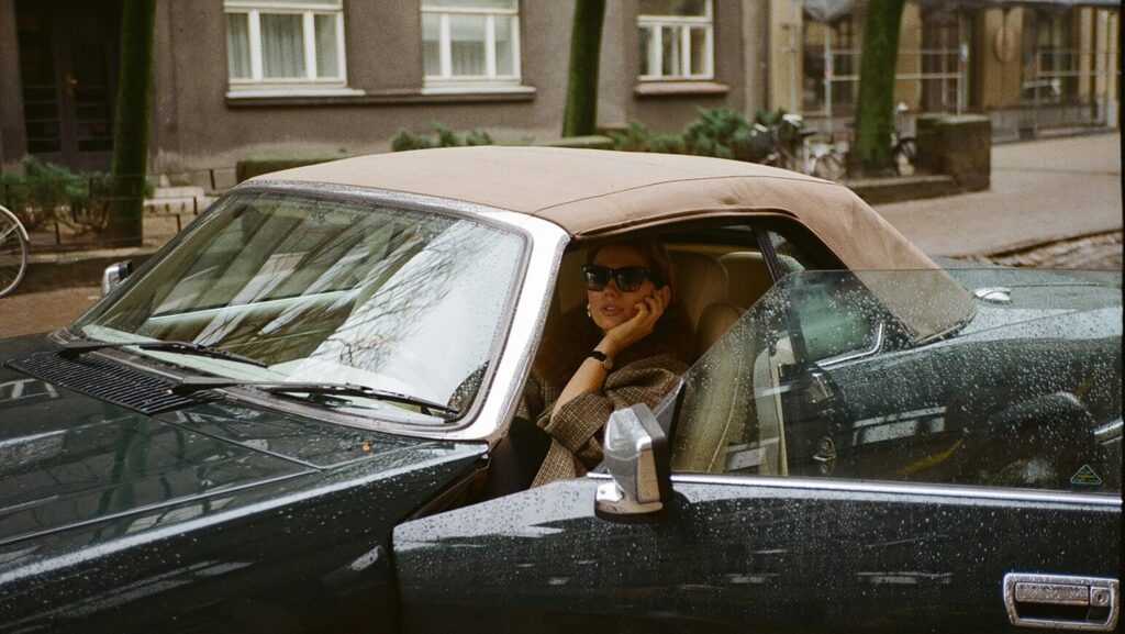 A Woman in a Car having a Phone Call